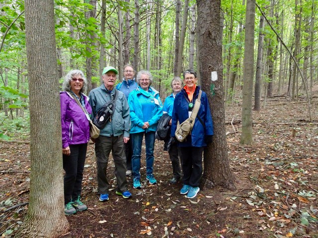 Pictured holding the specially designed water tote bags are:  Barb Lewis, Paul McCreath, and Fern Splichal.  Joining them on the journey out of Scout Valley are Wendy Kirk, Isabelle Lloyd, Isobel Thorup, and Carol Strickland.             