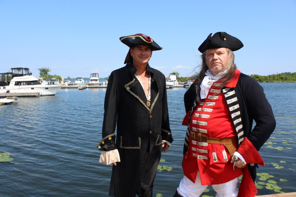 Allan Lafontaine, left, managing director of the Orillia District Chamber of Commerce, and re-enactor Tom Hurlbut are getting ready for the second annual Port of Orillia Pirate Party, happening Aug. 30 to Sept. 1. Nathan Taylor/OrilliaMatters