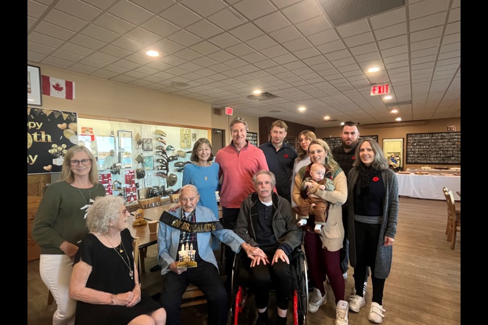 Three generations of family are shown with Jack Grinyer on his 100th birthday on Saturday at the Royal Canadian Legion in Orillia.