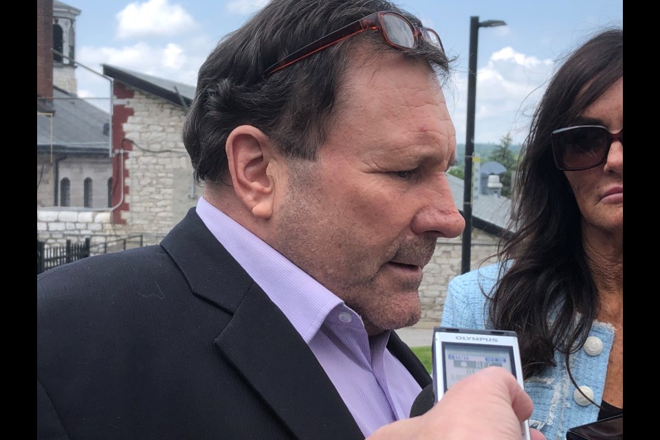 Rob Sampson talks to reporters outside the Barrie courthouse after being found not guilty in the murder of his girlfriend, Tracey Reid, who was found dead outside her residence on Davey Drive in Orillia in 2019.