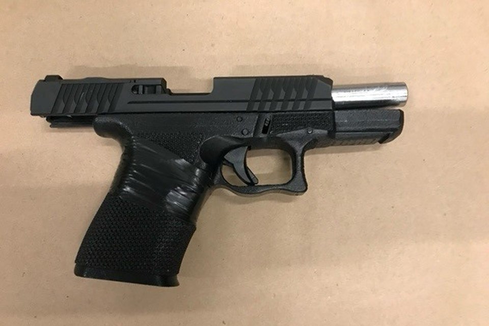 Police say they sezied a load 9mm handgun that was accessible to driver and passenger