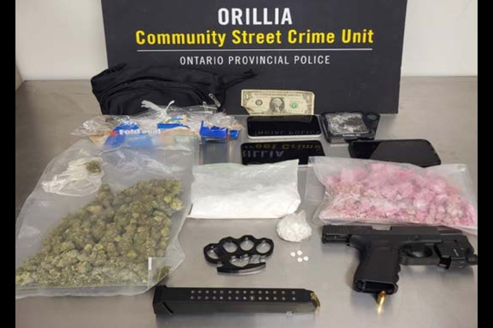 Police seized a gun, drugs and other items during a takedown Wednesday in Orillia.