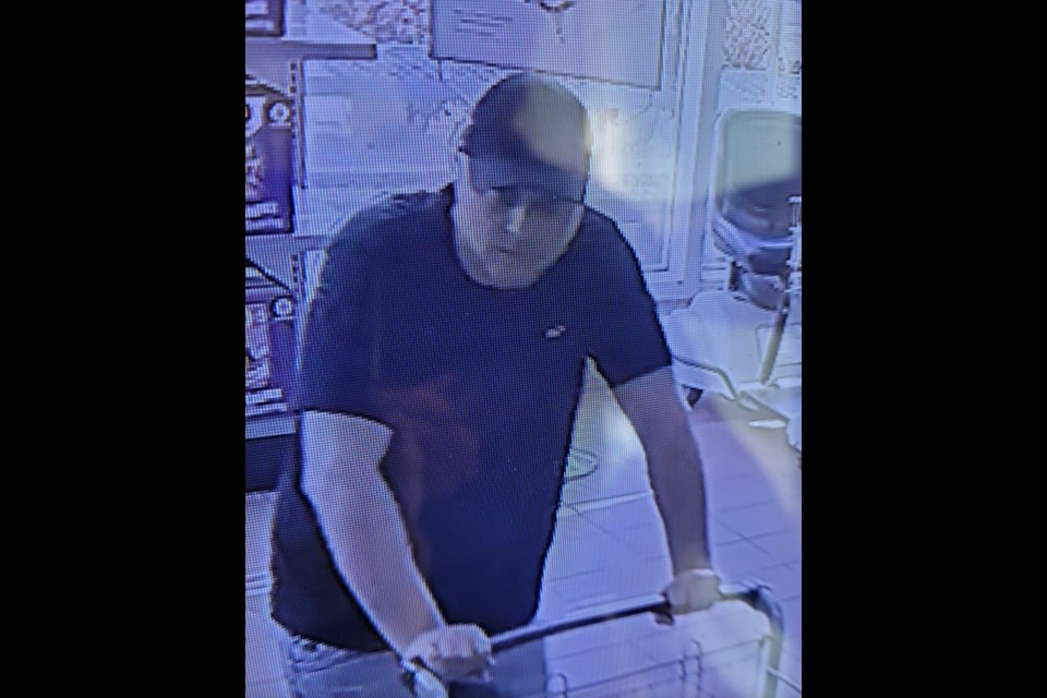 Police are looking this suspect in relation to a theft from a grocery store in Gravenhurst.