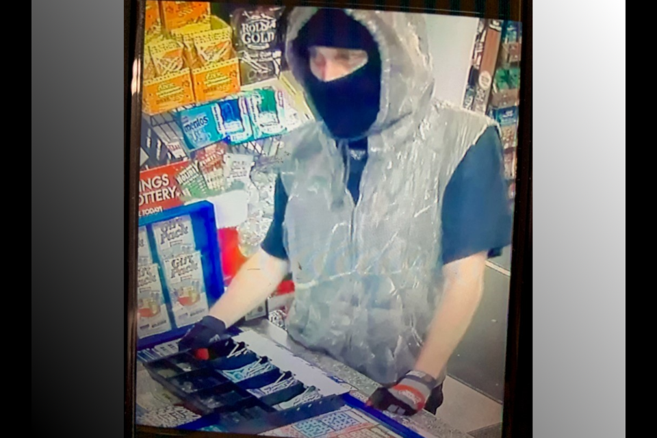 Police provided photo shows robbery suspect.