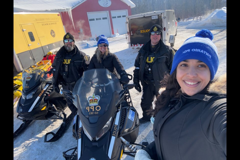 Simcoe North PC candidate Jill Dunlop (middle) is shown with uniformed OPP officers at a charitable snowmobile ride in Tay Township. This photo, posted on social media by the candidate, drew the ire of a resident who filed a complaint with the OPP over the "stunt."