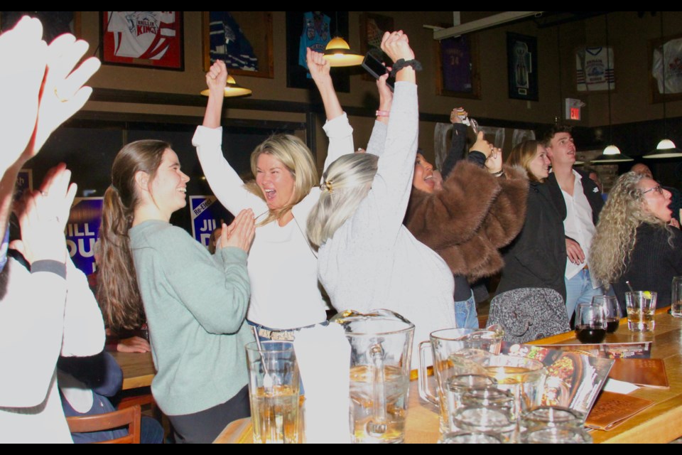 Jill Dunlop reacts when the television screen at Kelseys in Orillia showed that she'd won the Simcoe North riding. 