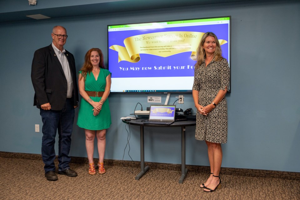 Information Orillia officially launched a survey today to identify gaps in newcomer services. From left are Orillia Mayor Don McIsaac, Information Orillia executive director Tammera Seyffer, and Simcoe North MPP Jill Dunlop. 