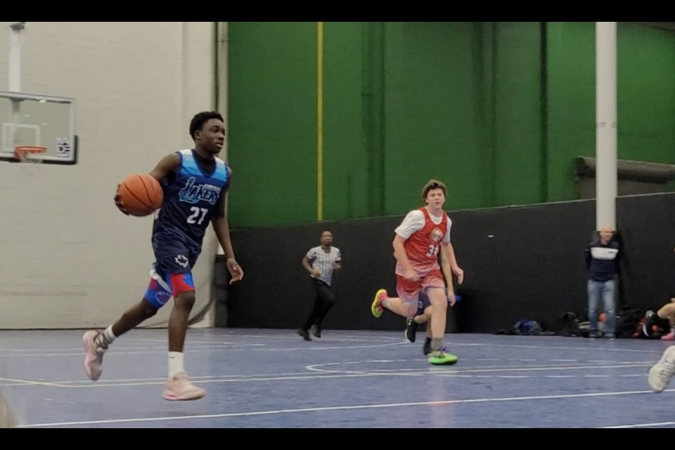 Orillia Lakers athlete Ezra-Terrelle Attah handles the ball in a game against Moore Brothers Elite.