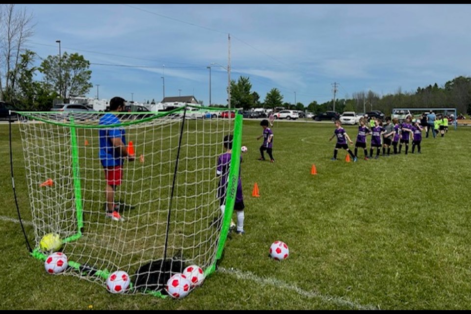 Young members of the Ramara Soccer Club are shown during recent play.