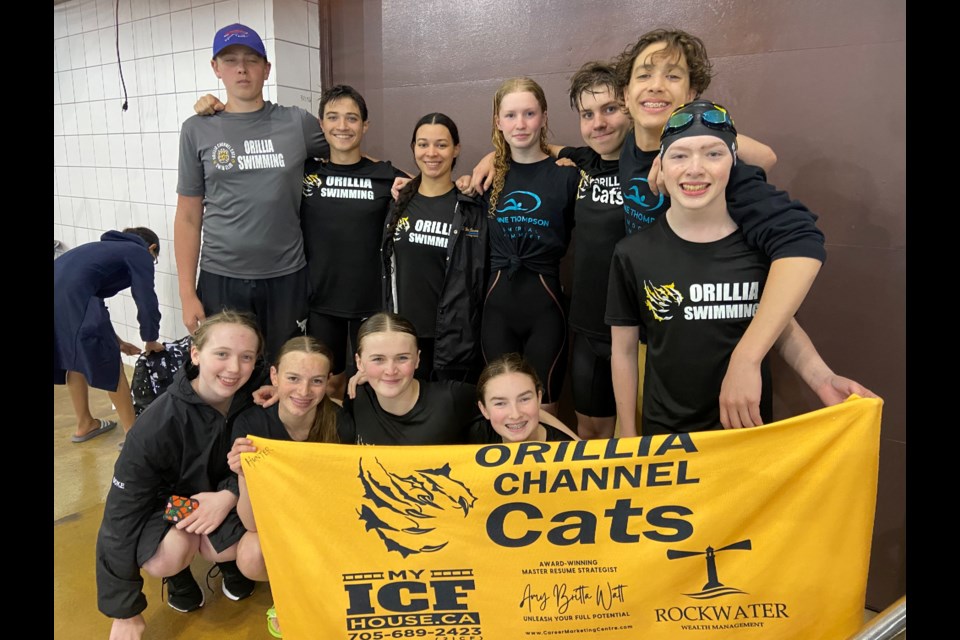 Members of the 13-and-over Orillia Channel Cats are shown at the Hamilton Aquatic Club Spring Fling.