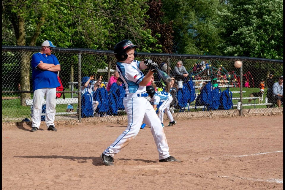 Orillia Royals right fielder Travis Collins squares one up during the Gander Ross Tournament at Kitchener Park.