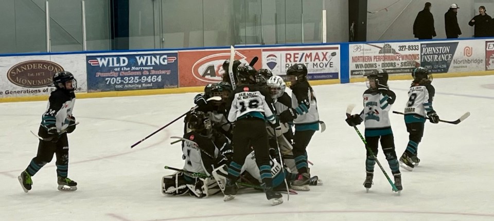 2024-03-11-u10-terriers-celebrate-ot-win