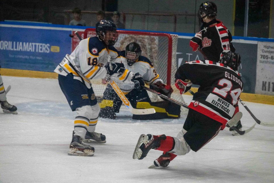 Orillia Terriers' defenceman Evan Gliddon fired a puck just wide of Huntsville Otters' goalie Austin Serbinek on Saturday night at Rotary Place in west Orillia. Orillia scored a 9-3 victory in their home opener.