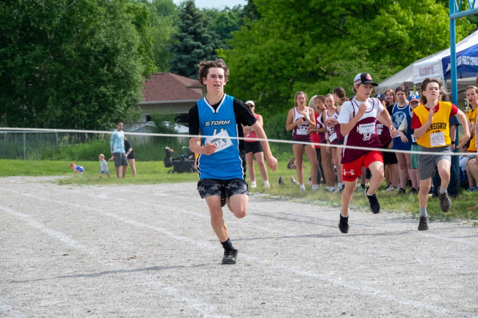 Devan Molloy from Severn Shores Public School finished second in his heat during the 200-metre race at the city-wide track and field event on Wednesday afternoon. More than 400 students competed in various events.