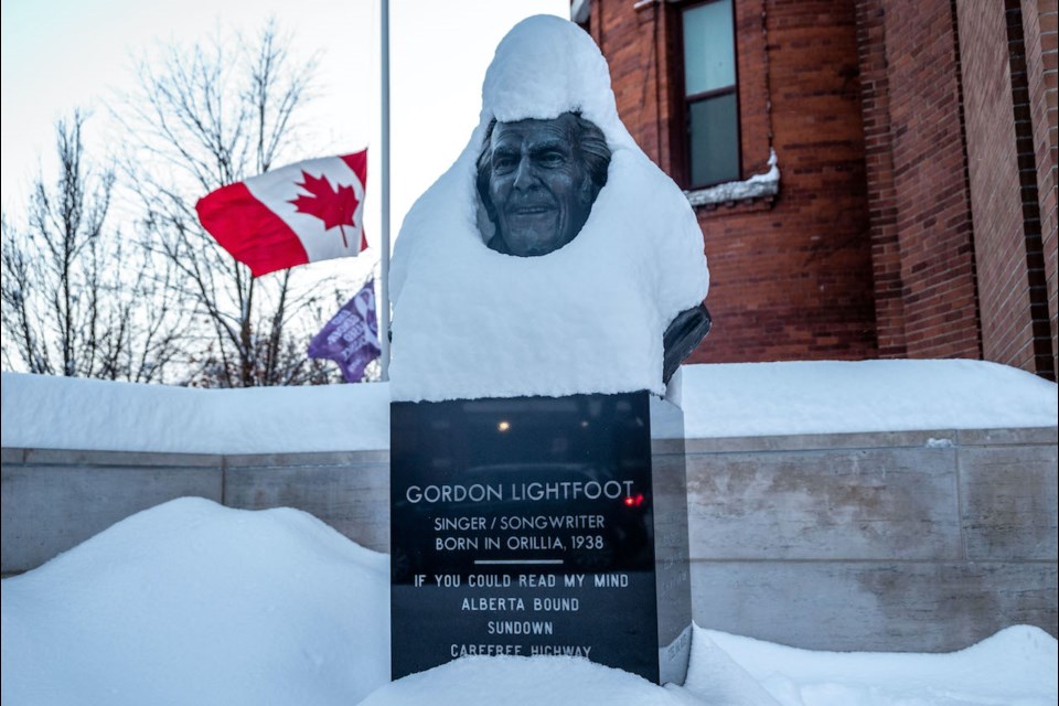 Saturday's winter storm, that dumped more than 40 centimetres of snow on Orillia, made driving difficult. But it blanketed downtown Orillia in beauty, as evidenced by the busy of Gordon Lightfoot outside the Opera House that was piled with fresh snow.