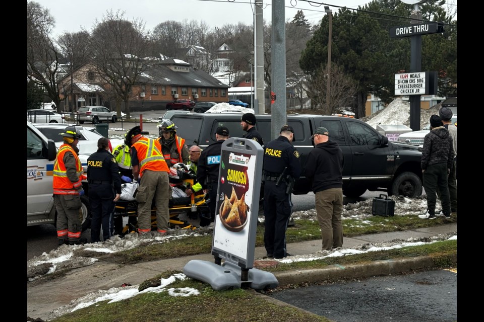 A cyclist was hit on Memorial Avenue near its intersection with James Street West this afternoon, with the victim loaded onto a stretcher and into an ambulance. 