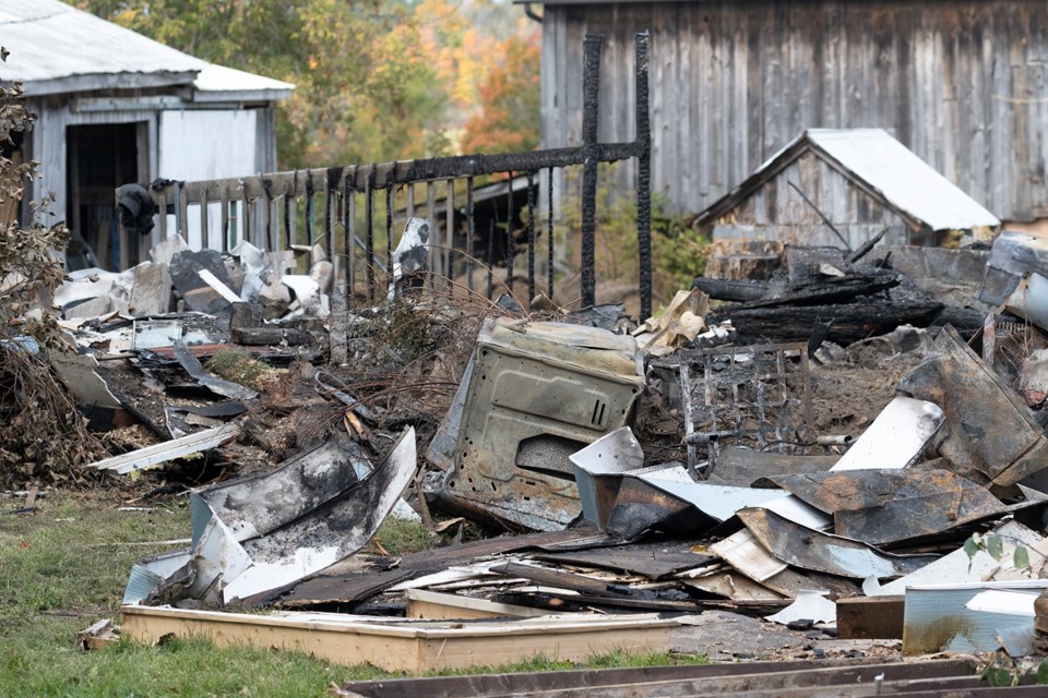 The charred ruins of a home at Peter Street and Line 3 in Oro-Medonte on Tuesday afternoon following an explosion and fire late Thursday night. No one was home at the time.