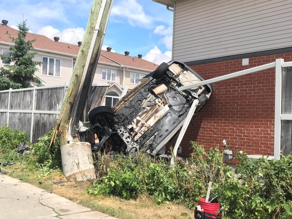 Car flips into house after hitting hydro pole in Barrhaven ...