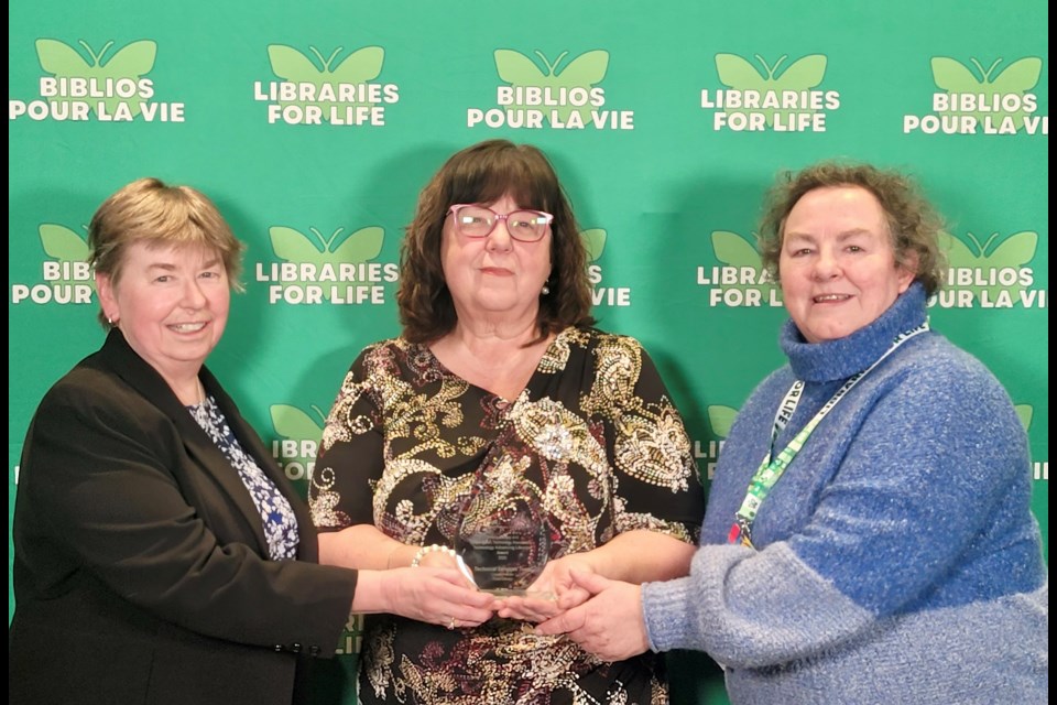 OLITA award photo - Left to right:
Donna Burton, Chair, Lincoln Pelham Public Library Board; Julie Andrews, CEO, Lincoln Pelham Public Library; Ruth Gretsinger, Lincoln Pelham Public Library board member