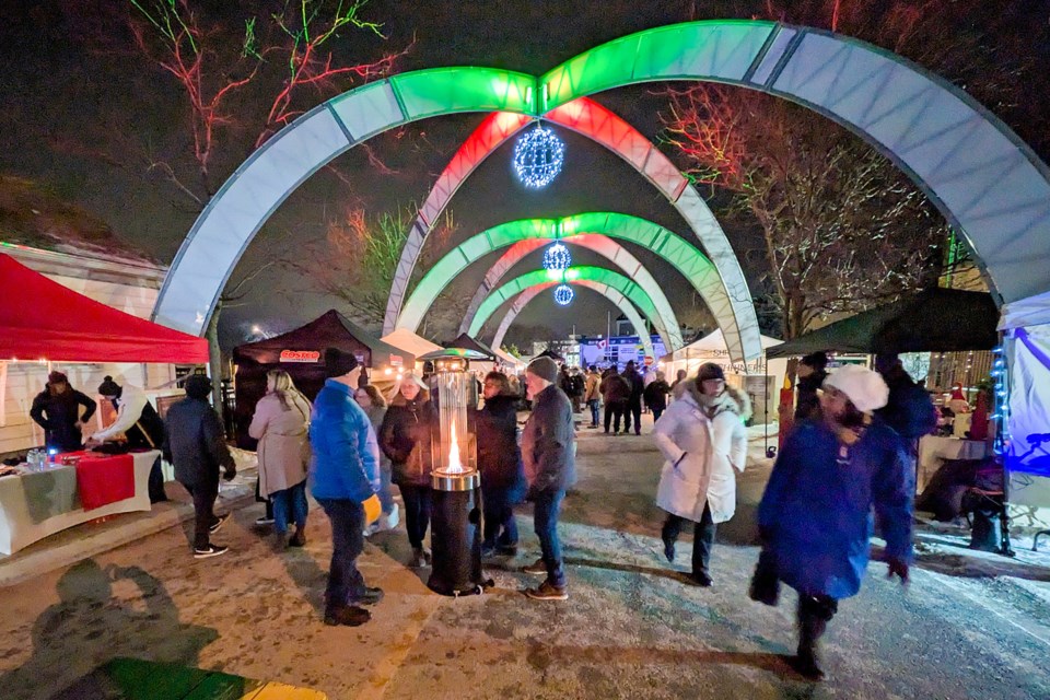 A smaller crowd, perhaps, than in previous years, but no less happy to attend Friday evening's Town of Pelham Christmas Market under the arches on Pelham Town Square. Various vendors hawked wares, food, and drink. Alpacas, Santa, and song rounded out the event.