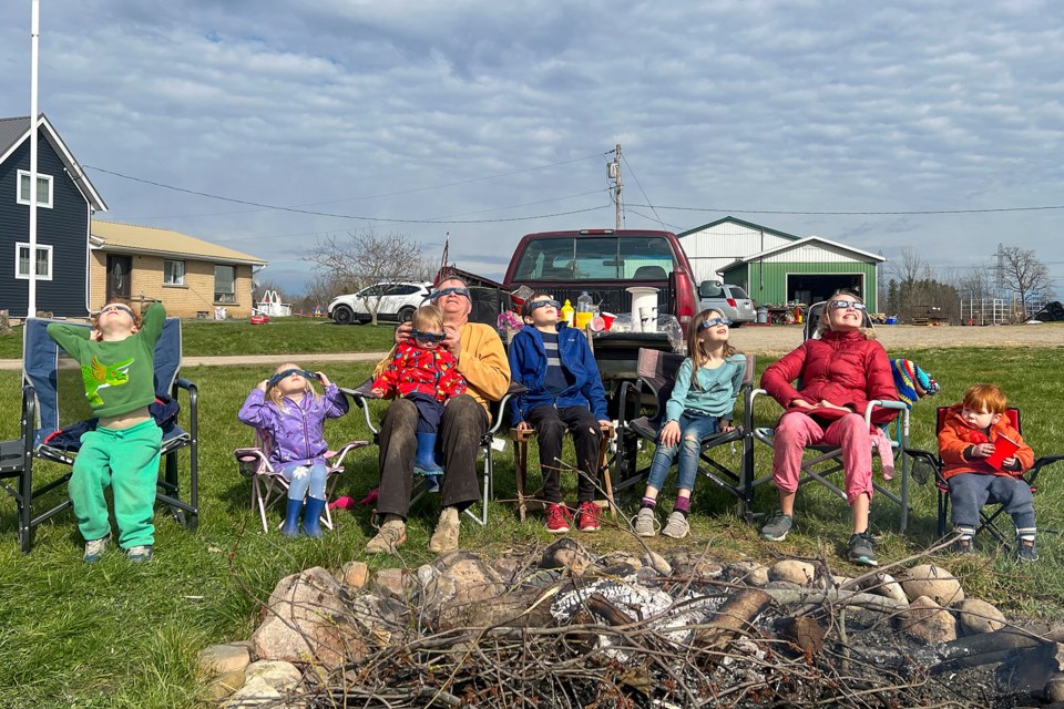 Mayor Marvin Junkin hosted a passel of grandkids on his farm for Monday's eclipse—Wesley, Piper, Teddy, Jack, Felicity, Charlotte, and John.