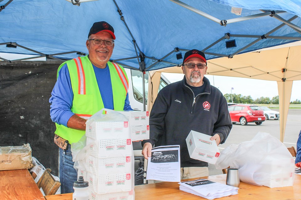 Kinsmen Jim Yungblut and Larry Yochim were keeping tabs on the hundreds of dozens of Krispy Kreme doughnuts that would soon find their way into the hands – and mouths – of fans of the sweet treats. The Fonthill and District Kinsmen were selling the donuts to raise money for the Momentum Choir, a singing group made up of individuals living with physical and intellectual challenges.