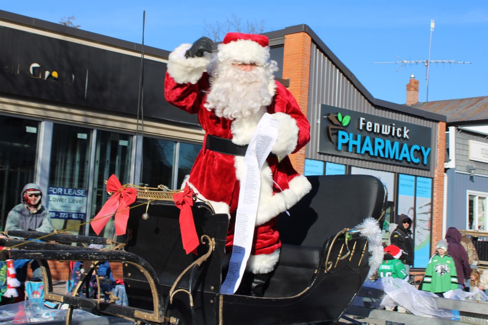 Santa Claus was the main attraction as crowds lined the streets of Fenwick Saturday for the Pelham Santa Claus Parade.