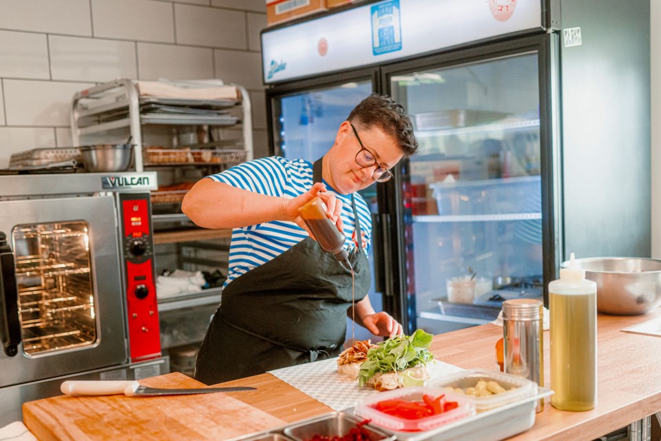 Chef Jess Marshall at work in the kitchen at Fonthill’s Stoke Deli Bar.