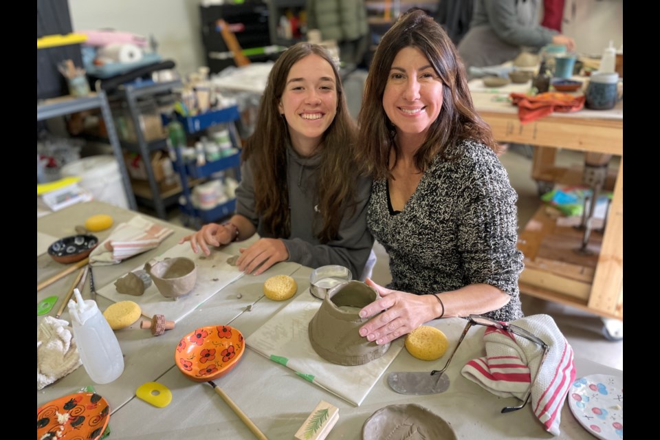 Dominque Clark of Vancouver with Katherine Curall of Whistler hand make bowls to donate to the Empty Bowls fundraiser. 