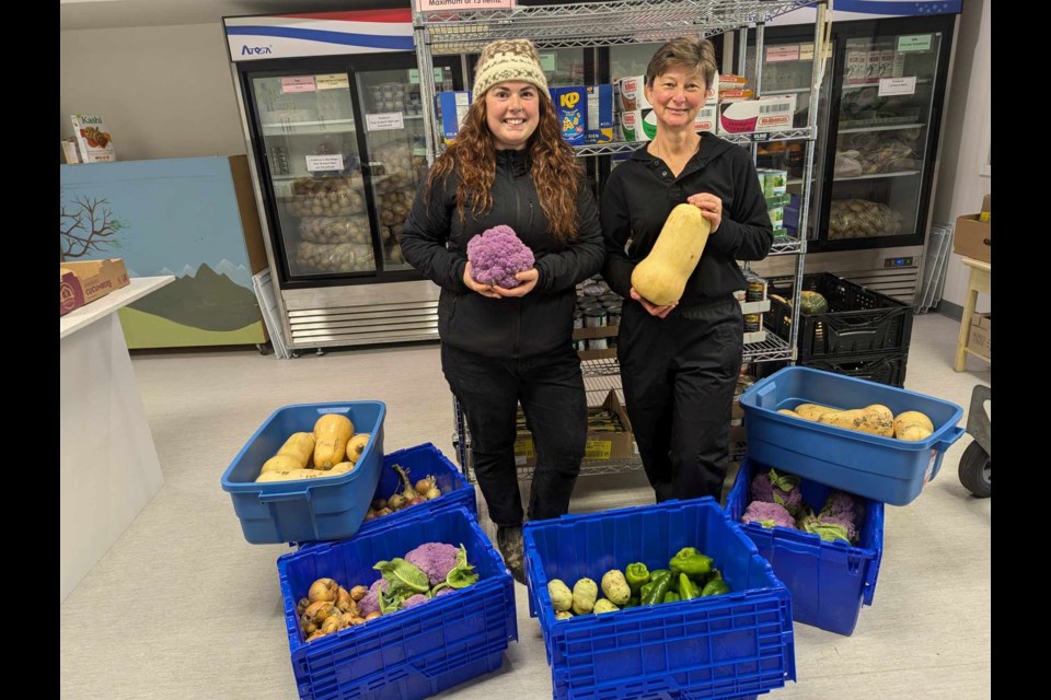 Maeghan Waters and Sharon Day stand together at the Pemberton Food Bank. Loralee Seitz, coordinator for the Pemberton Food Bank, said they wouldn't have fresh produce without the program.