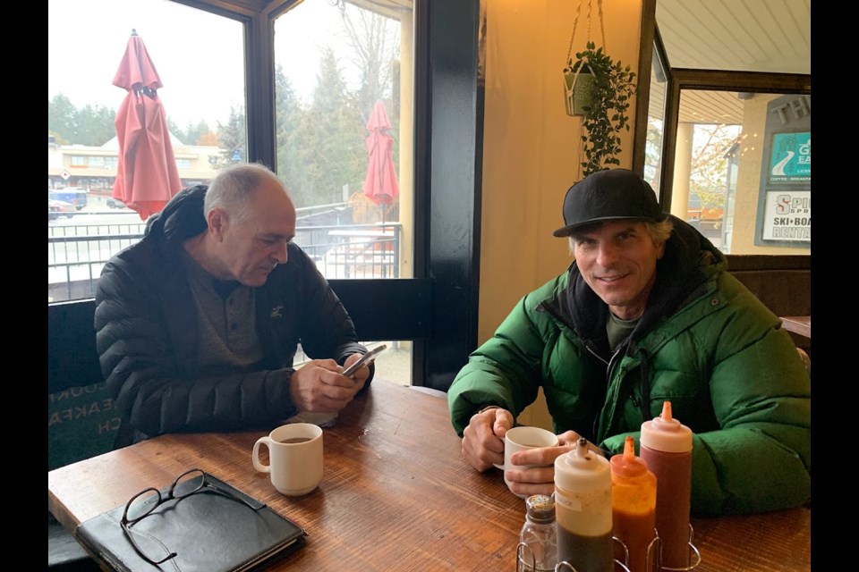 Joe Mooney (left) and Jeff Isert (right) drinking coffee at Gone Eatery. 