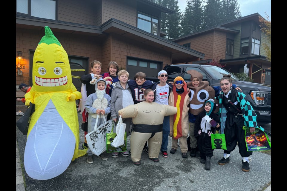 SUGAR BONDS For the last decade these kids have been trick or treating together and the traditional photo has been taken on Lindsey Ataya and Mark Kester’s front lawn on Whitewater Drive in Cheakamus. Along the way, a few more friends and siblings have joined the team. 