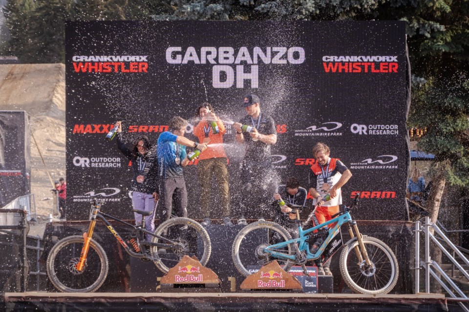 2024-garbanzo-dh-podium-champagne-clint-trahan-medium