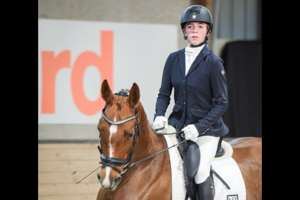 Ariel Girodo rides her Hanoverian horse, Wishingstar DMV.