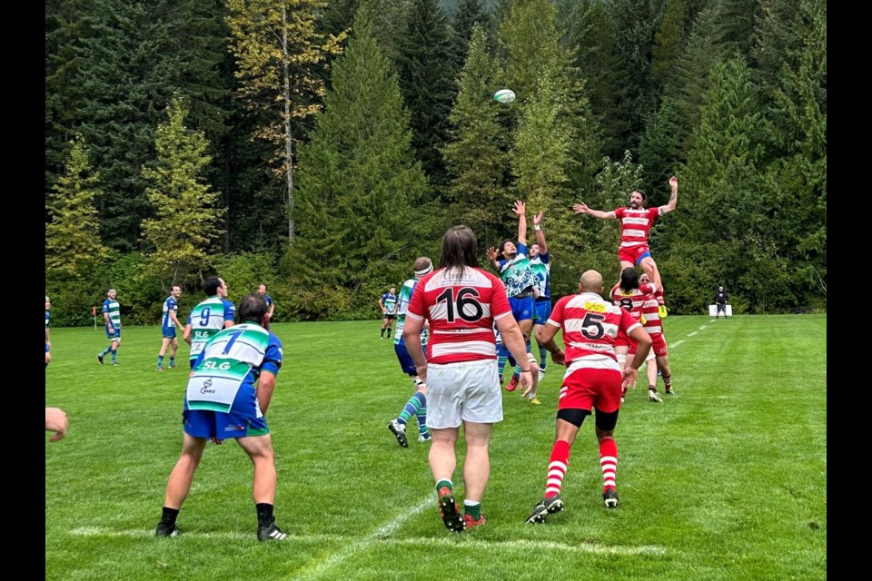 The Axemen (blue, white and green) contest a preseason lineout against the Vancouver Rowers and Kitsilano Kats (red and white) in Whistler on Sept. 14, 2024.