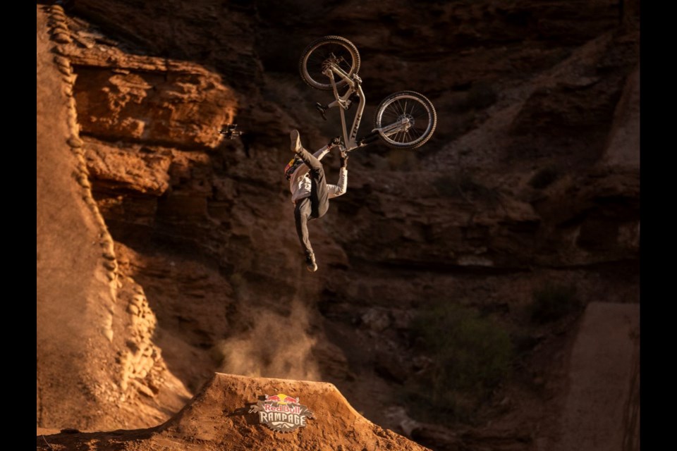 Brandon Semenuk throws a daring flip whip en route to victory at the 2024 Red Bull Rampage in Utah.