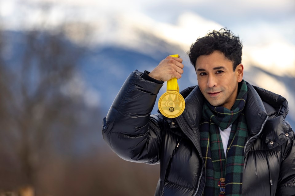 Lil'wat artist Levi Nelson displays a gold Invictus 2025 medal.