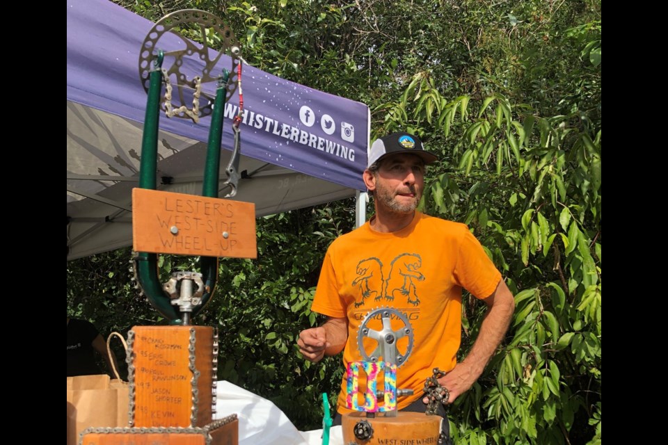 Jerome David stands next to the traditional Westside Wheel Up trophies in 2023.