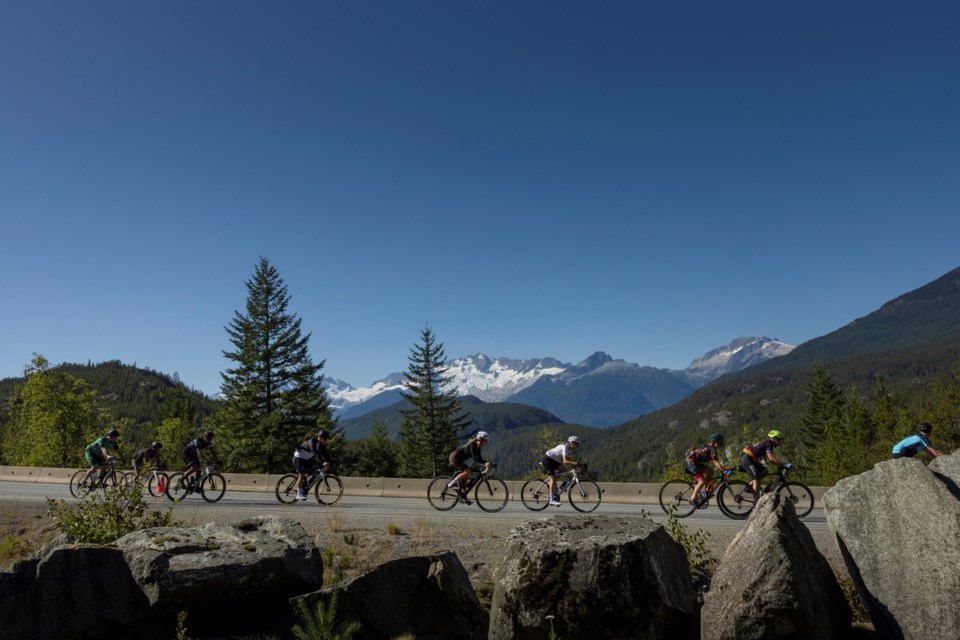 Cyclists on the Sea to Sky Highway during the 2023 RBC GranFondo Whistler.