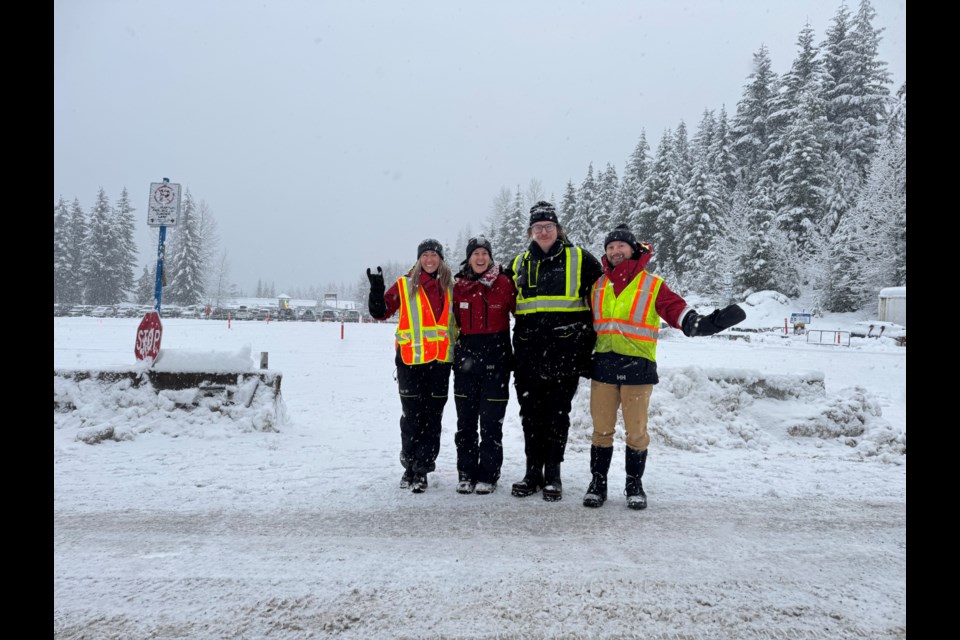 Kate Roddick (middle), senior director of operations and business development at WB, with members of the carpool operations team Dec. 28.