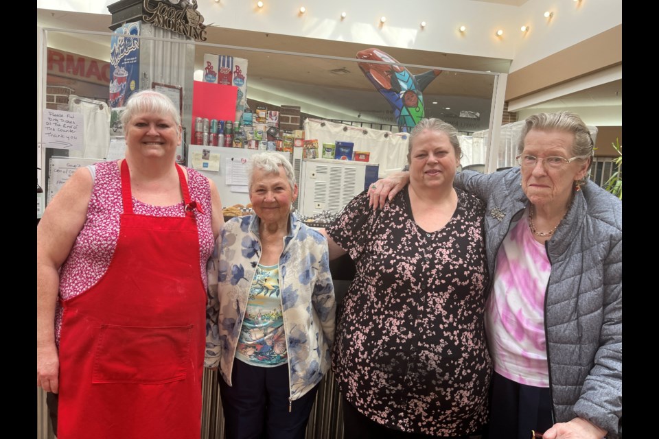SISTERS IN BUSINESS: [From left] Snack Attack Shack owner/operator Julia Huczel, regular customer Trish Todd, owner/operator Laurie Robertson and regular customer Marie Banks.
