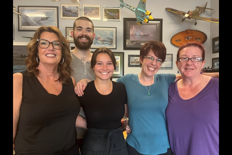 HAPPY WORKERS: Julie's Airport Café staff members [from left] Terri Schofield, Cameron McPhail, Meagan Ledret, Tamara Jones and Wendy Turner.
