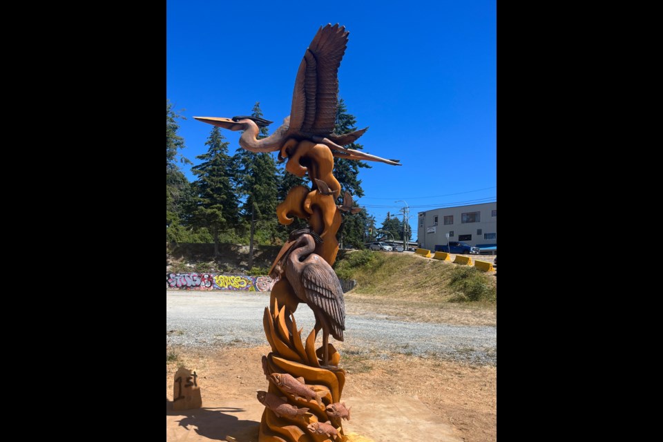 FIRST PLACE: Kamron Garbe, a multidisciplinary artist from Armstrong, BC, won first place for his piece titled, Heron Tower, at the Powell River Logger Sports carving competition last weekend.
