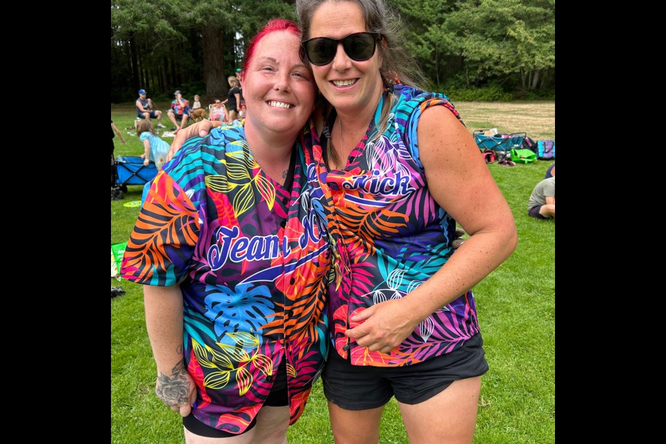 LOYAL FANS: Christina Vallier [left] and Dani Thompson have attended every Parkland slo-pitch tournament for charity since it began 25 years ago.
