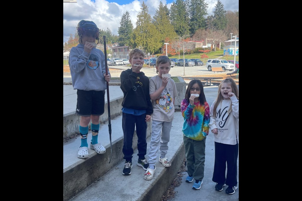 James Thomson Elementary School students [from left] Dax Ellis, Sawyer Hanson, Rivers Martin, Sora Takahashi, Sage Irvine took part in the Great Big Crunch on March 5.