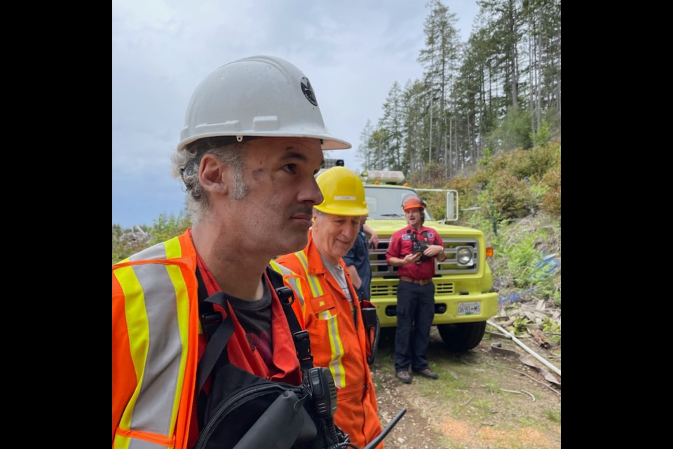 WILDFIRE SEASON: Assistant fire chief for Gillies Bay Fire Department Ben Reiman [foreground] says a wildfire initial attack vehicle is needed for some of the difficult to-get-to areas of Texada Island
