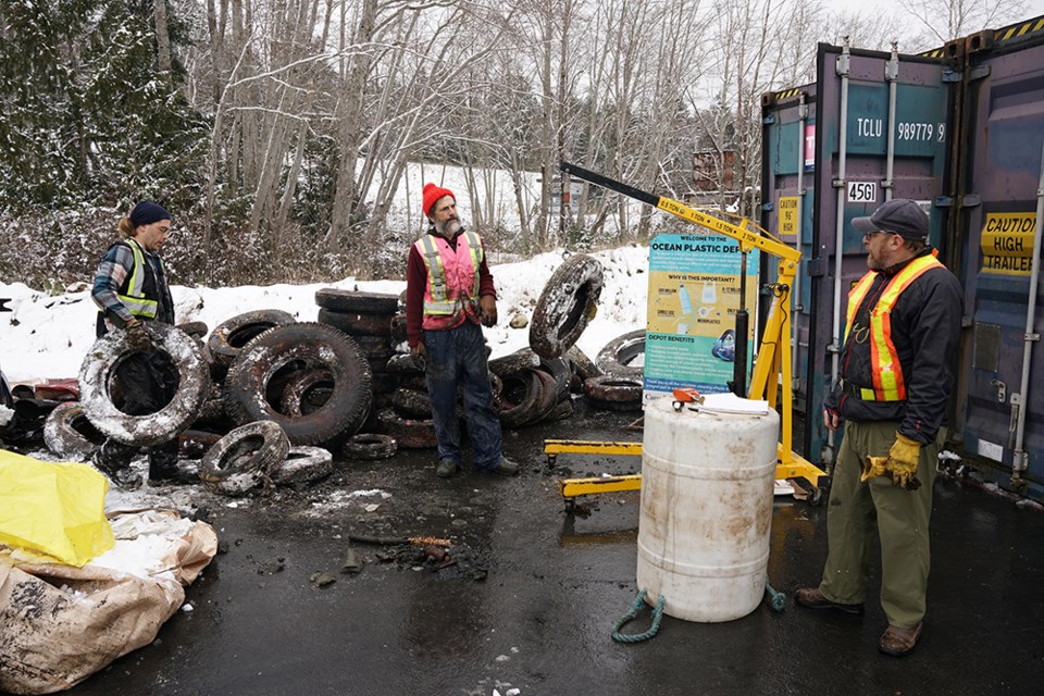 UNDERWATER ITEMS: Offloading marine debris collected from Lund Harbour, at the Ocean Legacy Foundation depot at the resource recovery centre, are [from left] Mawd Line, Theo Angell and Bill Sirota. The collection of the items from Lund caps off an impressive season, where 161 kilometres of shoreline was scoured and nearly 77 tonnes of material was collected, with 53 per cent being recycled or upcycled.                               