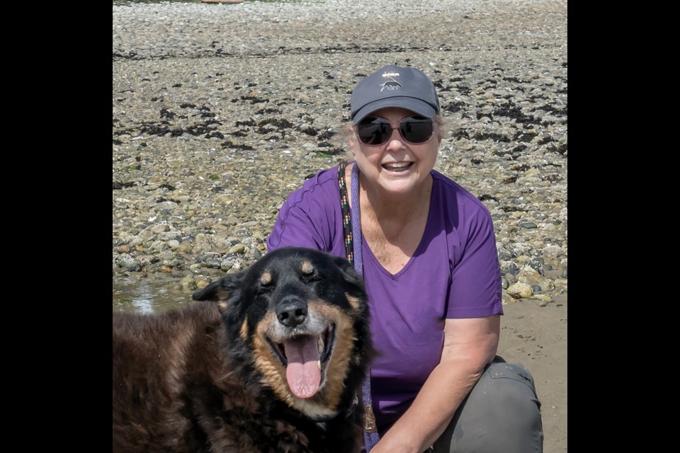 BEST BEHAVIOUR: BC SPCA AnimalKind-accredited canine trainer and behaviour specialist Sandy Middleton with her late dog TT. Middleton helps dog owners and their pets understand each other and their surroundings