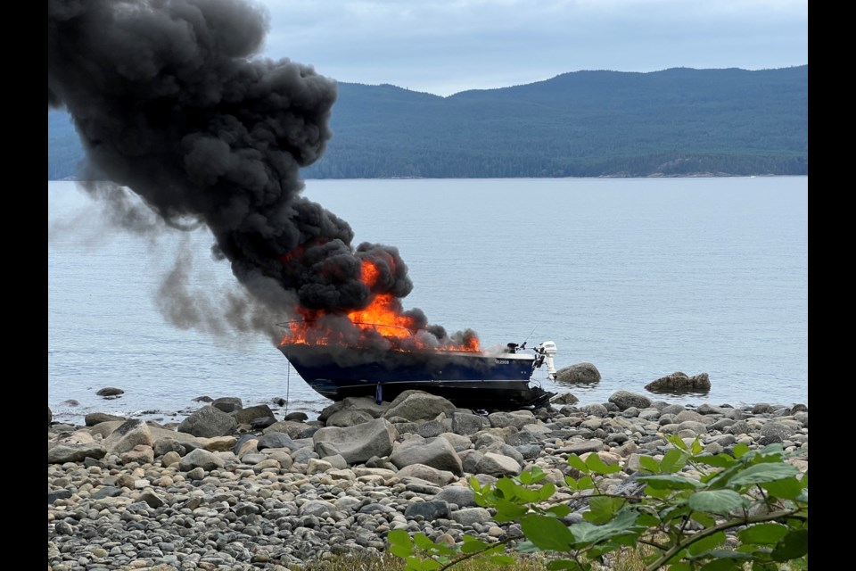 FRIGHTENING FIRE: On Sunday, August 11, witnesses saw a boat on fire that crashed on shore near Twin Eagles Road.
