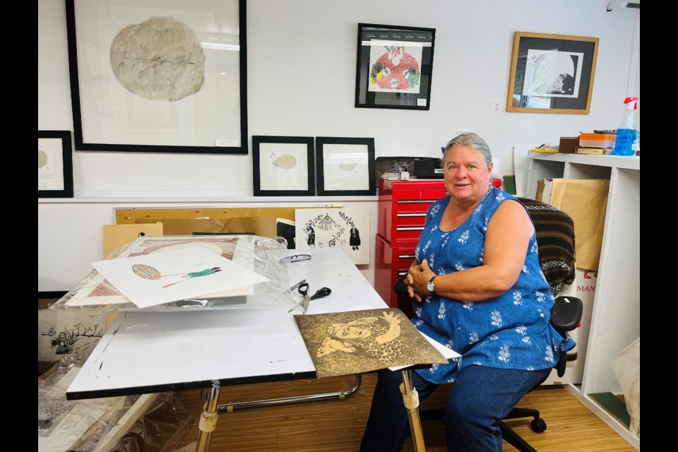 HOME STUDIO: Artist Donna Huber has a solo studio in her home in Westview. Her mediums include linocut printmaking, drawing and painting.
